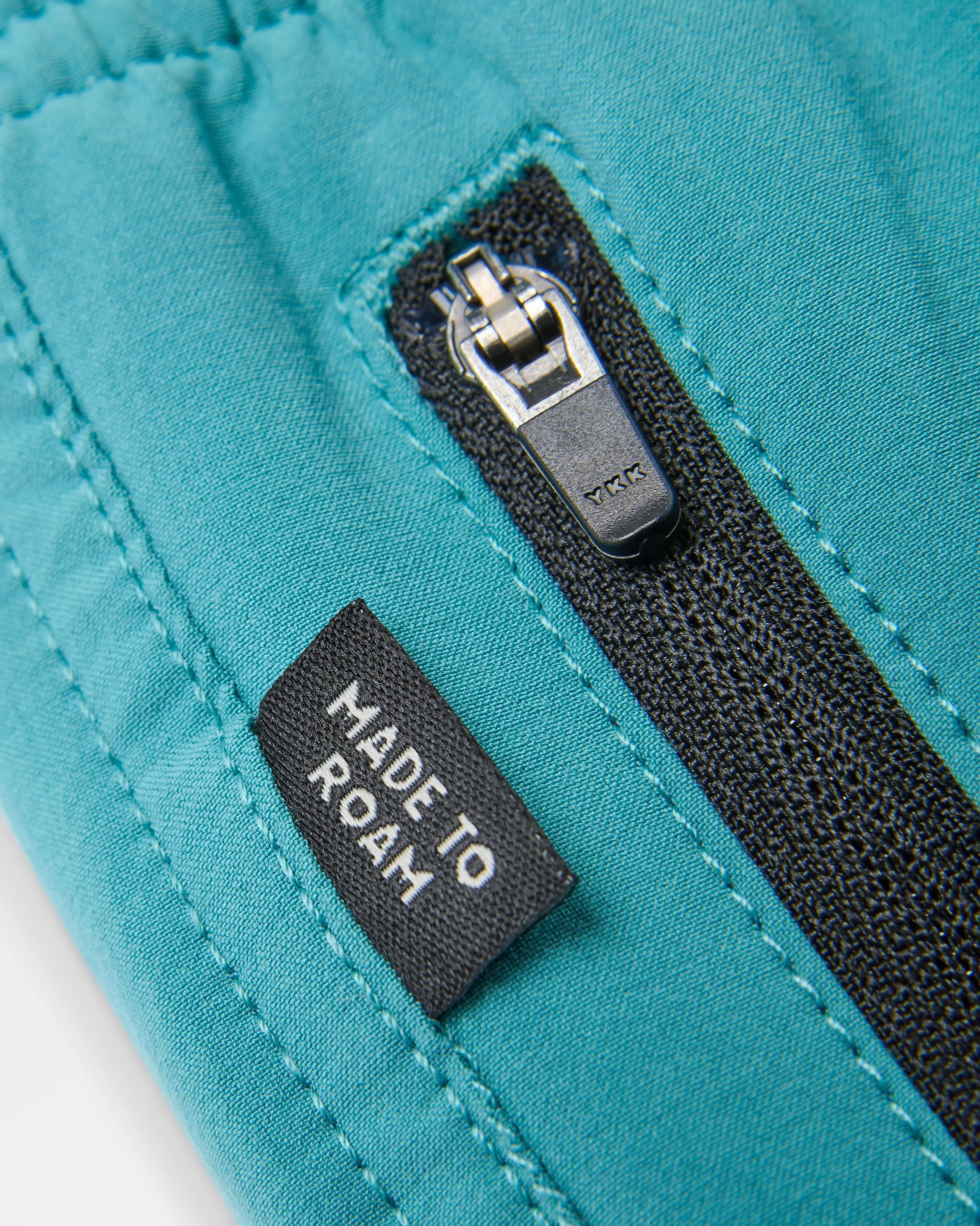 Traveller Organic All Purpose Short 2.0 - Ocean Teal - Flatlay