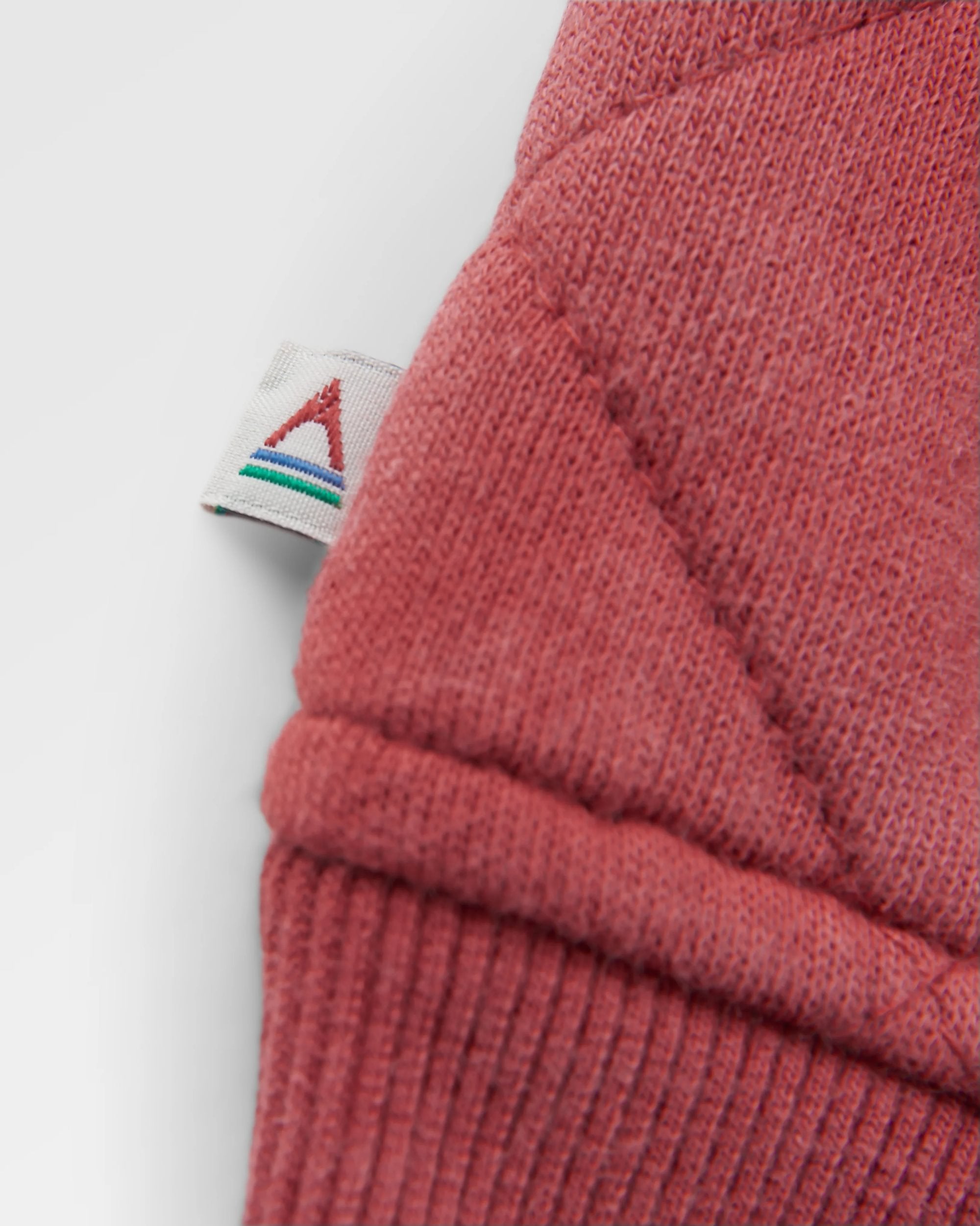 Clementine Recycled Quilted High Neck - Red Ochre - Flatlay